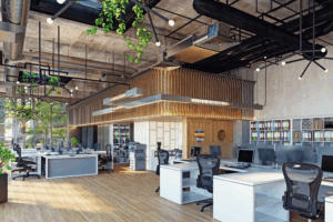 A clean and organized modern Houston open-plan office with desks, ergonomic chairs, wood accents, and natural light maintained by Aviva Cleaning Services.