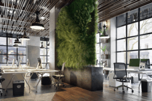 Modern open-plan executive office with green plant wall feature, polished desks, and industrial ceiling lights cleaned by Aviva Cleaning Services in Houston TX.